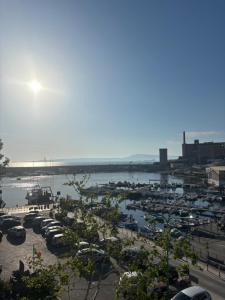 a view of a harbor with boats in the water at MareLuna in Torre del Greco