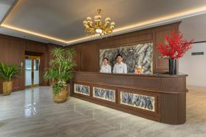 a lobby of a hotel with a reception desk at Grand Luxury Hotel Bắc Ninh in Chu Mẫu