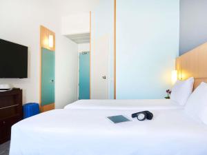 Krevet ili kreveti u jedinici u okviru objekta Ibis Como