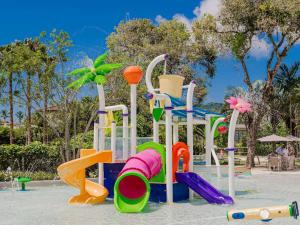 a playground with many different types of play equipment at Hotel Jequitimar Guaruja Resort & Spa by Accor in Guarujá
