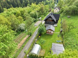 an aerial view of a house in the woods at Gryglówka Noclegi in Zembrzyce