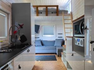 Køkken eller tekøkken på Tiny House am Naturteich mit Grill & Kamin - bis 5 Personen