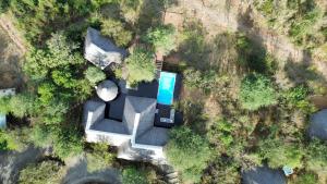 an overhead view of a house with a pool at Tulani Boutique Lodge - Includes Game drives and Meals in Grietjie Game Reserve