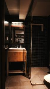 a bathroom with a sink and a shower at Cozy & Spacious 2BR Private House in Siem Reap +22 photos