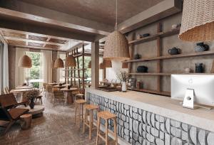 a restaurant with a bar with wooden stools at Nordic Vida Hotel in Cuxhaven