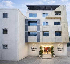 a building with the front entrance to the six star hotel at Skylark Hotel by Gabrian Hotels in Gurgaon