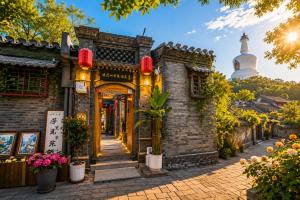 an entrance to an old building with a mosque in the background at Beijing Templeside Courtyard Hotel 丨 3 metros to the Square丨Free laundry, personalized services large terrace in Beijing