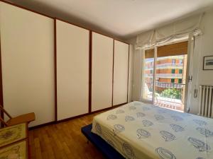 Llit o llits en una habitació de MAREBLU Rapallo Mare
