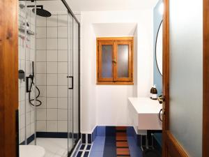 a bathroom with a shower and a sink at La Donota in Trieste +52 photos
