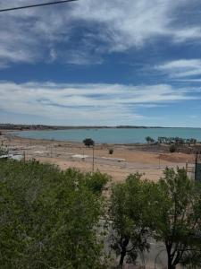 a view of a beach with a body of water at Квартира 1 линия in Balqash