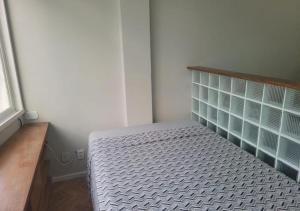 a small bedroom with a bed in a room at SUH Leme 04 Studio Comfort in Rio de Janeiro