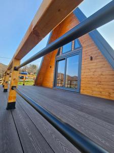 a view of the deck of a cabin with a large window at Moonrise house Rudnik in Rudnik