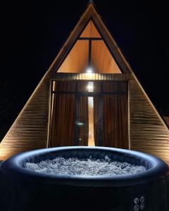 a large blue tub with a window in a house at Delta Rest House in Nor Hachyn +2 photos