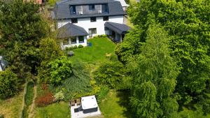 an aerial view of a house with a yard at Holistyczne Ujęcie in Głody +36 photos