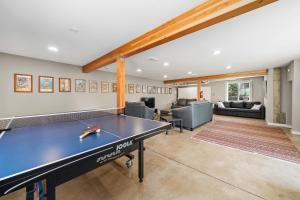 a living room with a ping pong table at Sasquatch House MCA#50631 in Manzanita