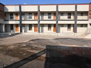 an empty parking lot in front of a building at Gae Ga Monare Guest House in Burgersfort +27 photos
