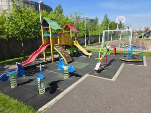 a playground with a bunch of play equipment at Konstanzer 103 - 2 Room Ap & Parking- Iulius Mal - Smart TV - Highspeed Wi-Fi in Iaşi