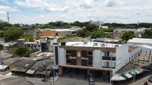 an overhead view of a city with a building at Hotel Baos in Sincelejo