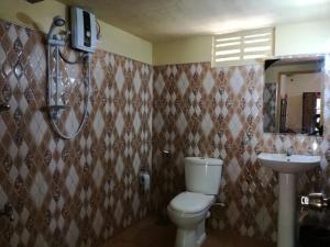 Koupelna v ubytování Pinthu Home Stay