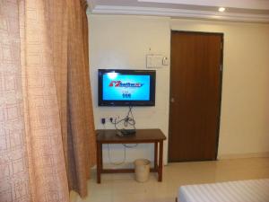 TV a/nebo společenská místnost v ubytování Hotel Rajdeep
