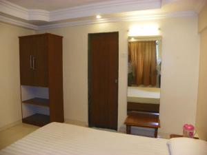 Postel nebo postele na pokoji v ubytování Hotel Rajdeep