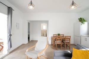 a living room with a couch and a table at La Tertulia in Zahora