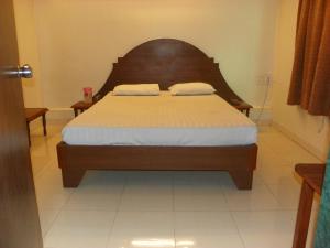 Postel nebo postele na pokoji v ubytování Hotel Rajdeep