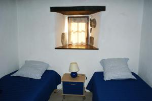Postel nebo postele na pokoji v ubytování Gîte Laboule pour 4 personnes