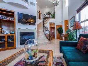 a living room with a couch and a fireplace at Condo 40-4 El Dorado Ranch in San Felipe