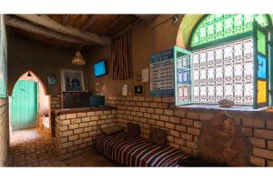 a room with a couch and a window at Maison Zouala in Zouala