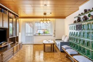 a living room with a couch and a table at Ferienwohnung Franni in Wabern