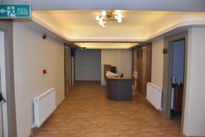 an empty hallway in an office building with a hallway at Görele Liva Otel in Görele