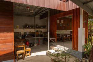 a large room with a kitchen and a table at La Casa Josefina in Aga