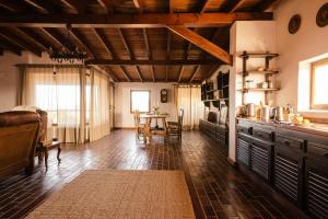 a kitchen with a table and a dining room at Finca Vilaflor in Vilaflor +26 photos