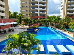 an image of a swimming pool at a resort at Tonsupa Playa Almendro in Tonsupa