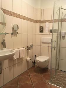 Koupelna v ubytování Hotel Farchauer Mühle