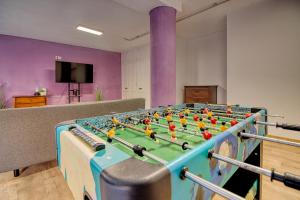 a foosball table in a room with toys on it at 4BR Wellness Villa- Pool, Sauna, Gym in Puerto de la Cruz