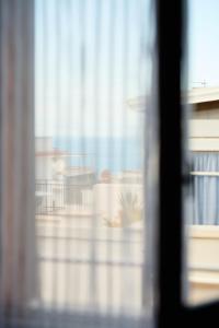 a view from a window with a view of a building at B&B Soldano in Peschici