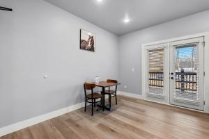 a dining room with a table and two chairs at #7 Studio Town Place 2 in Sevierville