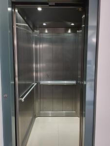 a walk in shower with a glass door at SAN jose in Federación