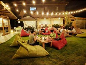 a group of people sitting on bean bags in a room at THINK - Vacation STAY 30630v in Ichigaya +29 photos