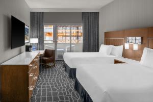 a hotel room with two beds and a television at Hyatt Regency Princeton in Princeton +65 photos