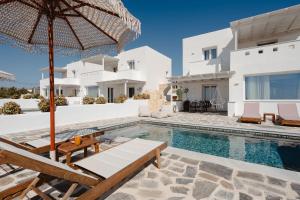 an image of a villa with a swimming pool at Villa THÉA - Private pool, Stunning Sea views in Plaka