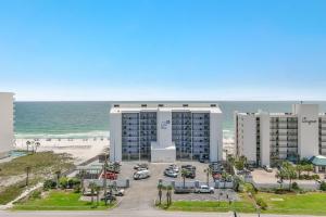 a view of a hotel and the beach at Lei Lani Unit 201T in Orange Beach