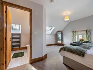 a bedroom with a bed and a mirror at 2 Bed in Stoke-on-trent oc-95164 in Longton