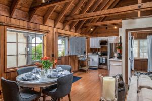 a kitchen and dining room with a table and chairs at 3796 The Madden Suite in Carmel