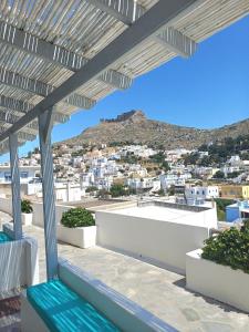 a view of the city from the balcony of a house at STELLA MARINA in Panteli