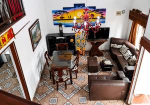 a living room with a couch and a table at samargo in Cali
