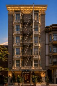 a tall building with stairs in front of it at Cornell Hotel Union Square in San Francisco