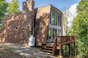 a brick house with a bench outside of it at 1186 Fairway Drive: Country Squire in Basye +45 photos